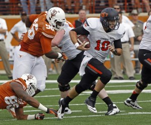 Oklahoma State QB Clint Chelf rushed for 95 yards, passed for 197 yards and and accounted for 4 TD's against Texas.