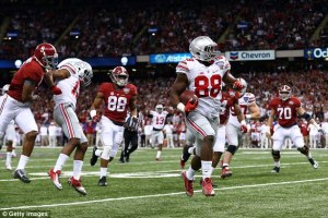Ohio State defensive end Steve Miller returns an interception for a touchdown in the Buckeye's upset over Alabama